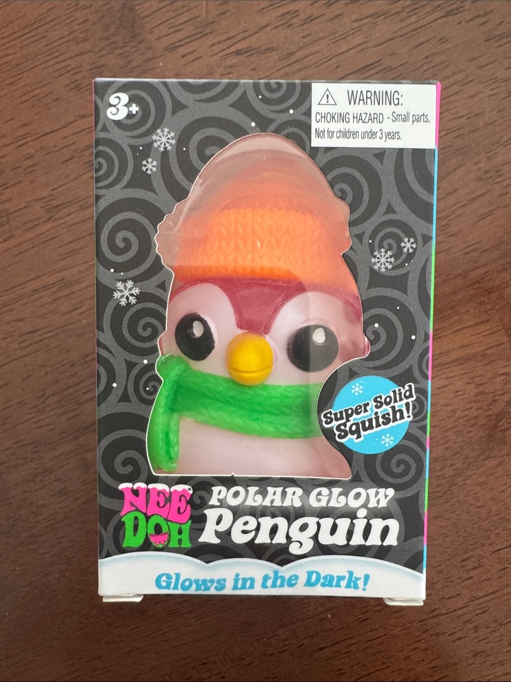Needoh squishy Polar Glow Penguin - Pink with Orange Hat and Green Scarf